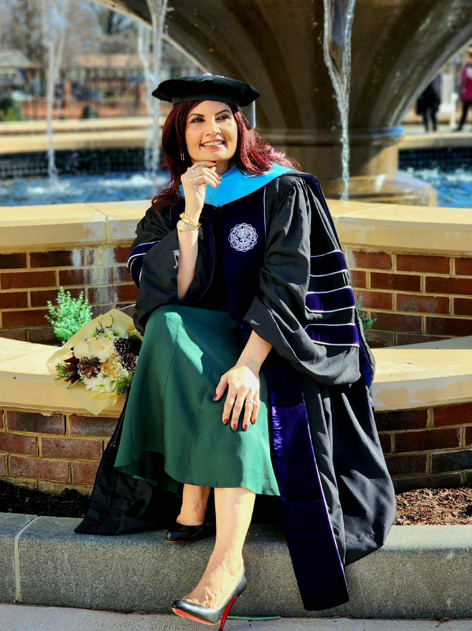 Dr. Samira Khan in doctoral regalia